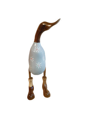 A Bamboo And Teak Duck With Pretty Grey Flowers And Boots