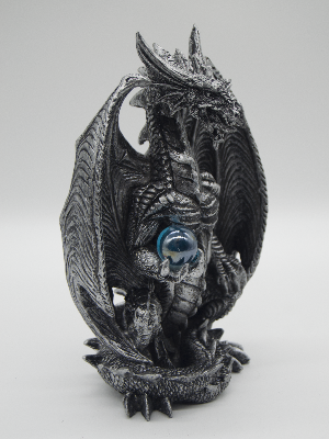Silver Dragon Holding A Blue Orb