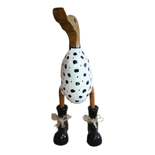 A Duck Wooden Stone Rock With Black Boots