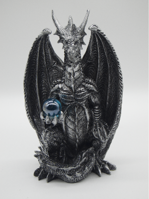 Silver Dragon Holding A Blue Orb